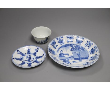 A Chinese Kangxi blue and white saucer dish and a similar tea bowl and saucer