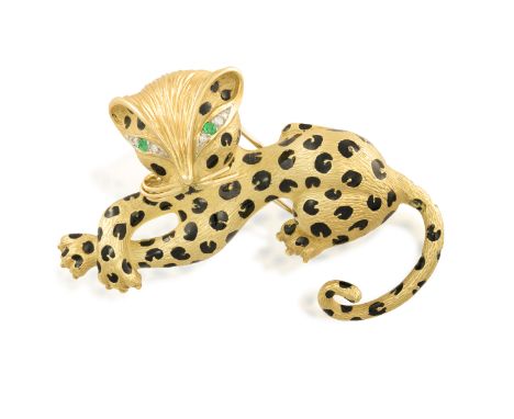 A GEM-SET NOVELTY BROOCH, POSSIBLY BY FRED PARISThe stylised leopard, textured to represent fur with black enamel spots on th