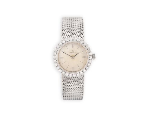 A LADY'S 18K GOLD AND DIAMOND-SET COCKTAIL WATCH, BY OMEGA, CIRCA 1960The 17-jewel Cal. 620 manual wind movement, silvered di