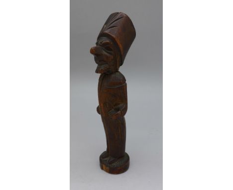A novelty carved wood pipe