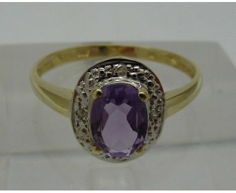 A 9ct gold, diamond and amethyst ring, weight 1.2g, size O