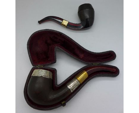 A Victorian silver mounted pipe, Birmingham 1976, with case and an amber stemmed pipe