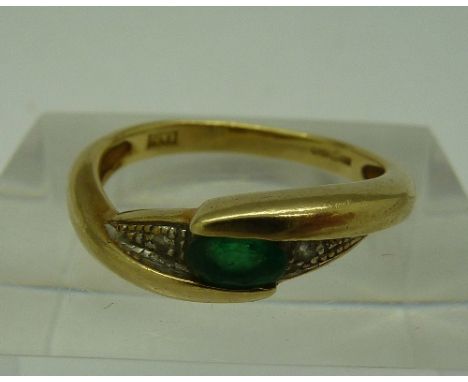 A 9ct gold, emerald and diamond ring, weight 1.9g, size M