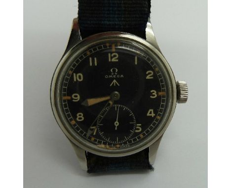 A gentleman's Omega military issue wristwatch, black dial, broad arrow mark, the case back stamped W.W.W. Y14870 10679089, th