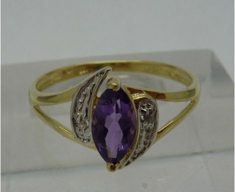 A 9ct gold, diamond and amethyst ring, weight 1.1g, size O