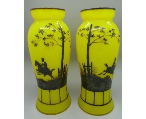 A pair of Victorian glass vases with hunting scenes, height 22cm