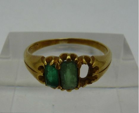 A yellow metal and green stone ring, weight 3.3g, size M, a/f
