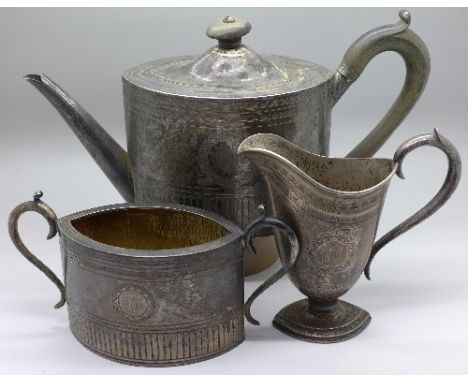 A Victorian three piece silver tea service, London 1859 and 1869, weight 1050.2g