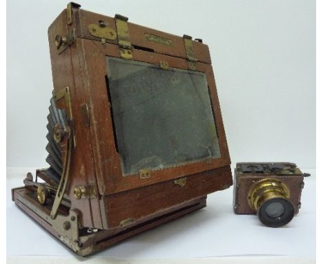 A wooden camera case with a Beck symmetrical lens