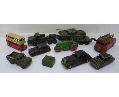 Nine Dinky toys, including tank and tank transporter, fire engine, double decker bus, etc.