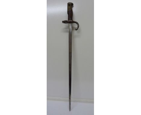 A World War I French bayonet, lacking scabbard, length 66cm