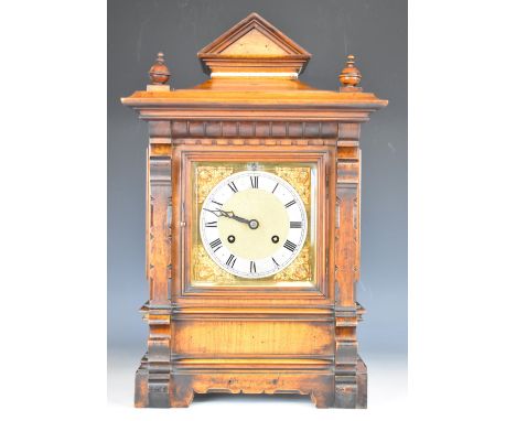 19th or early 20th century mahogany cased bracket or mantel clock, with gilt dial with silvered chapter ring, the two train m