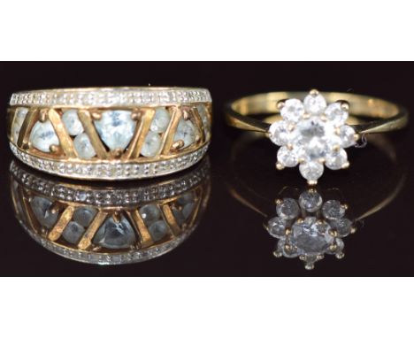 A 9ct gold ring set with topaz and diamonds and a 9ct gold ring set with cubic zirconia, 5.9g, sizes L &amp; M