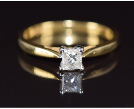 An 18ct gold ring set with a princess cut diamond of approximately 0.35ct, with certificate, 3.1g, size M