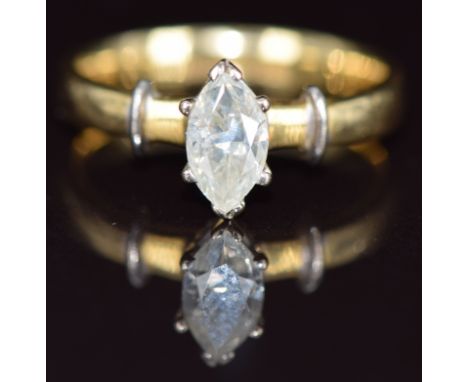 An 18ct gold ring set with a marquise cut diamond of approximately 0.7ct, 4.9g, size P