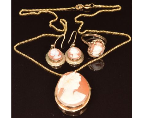 A suite of 9ct gold jewellery comprising brooch / pendant, ring and earrings set with cameos, 13.5g