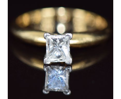 An 18ct gold ring set with a princess cut diamond of approximately 0.5ct, size L