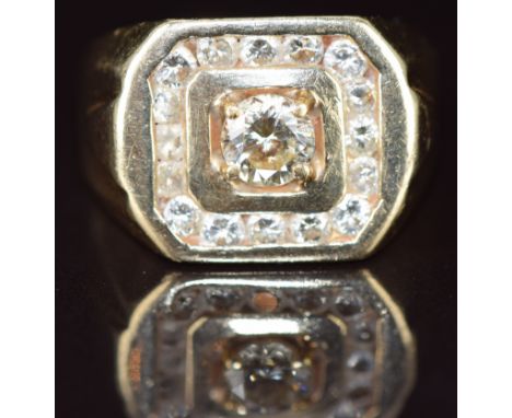 A 14k gold ring set with a round cut diamond of approximately 0.75ct surrounded by further diamonds, 12.6g, size U