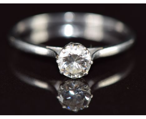 A platinum ring set with a round brilliant cut diamond of approximately 0.45ct, 2.1g, size O