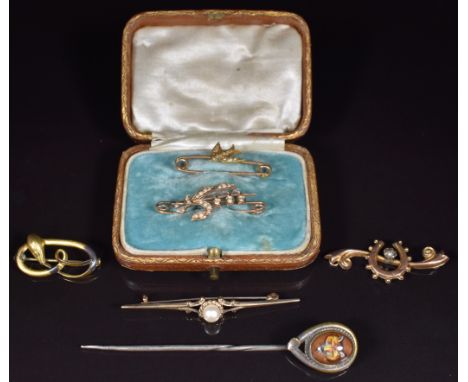 A 9ct gold brooch set with a pearl, Charles Horner serpent brooch, stick pin with reverse painted fox and two 9ct gold Edward