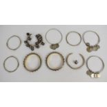 Three matching Indian silver bangles, three silver bangles with Indian silver / white metal coin