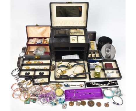 A collection of costume jewellery including two Swarovski brooches, two silver rings, Citizen Eco-Drive watch, Timex watch, t