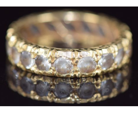 A 12ct gold eternity ring set with spinel, 3.6g, size I