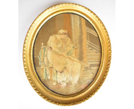 19th century needlework or tapestry picture of a lady seated in a hallway with stairs ascending behind her, holding possibly 