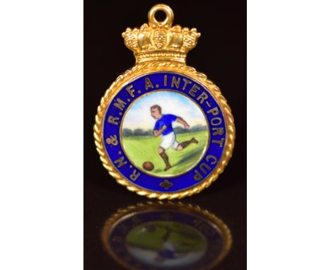 A 9ct gold fob/ medallion set with enamel depicting a gentleman playing football, 9.3g, 2.3cm