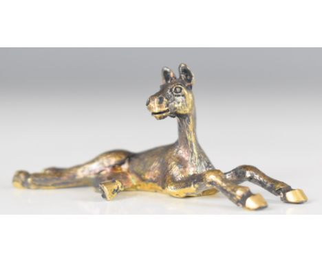 Stuart Devlin retro novelty hallmarked silver gilt model of a horse foal lying down, London 1981, length 6cm, weight 35g