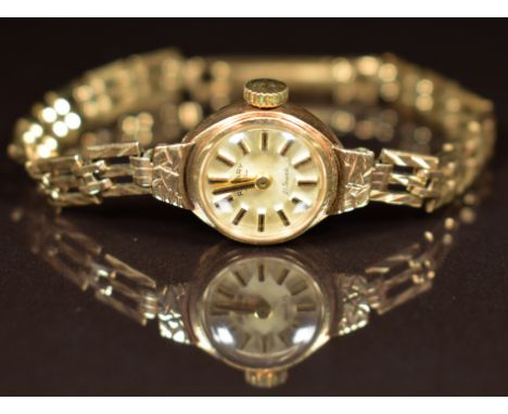 Rotary 9ct gold ladies wristwatch with two-tone hands and baton hour markers, silver dial and signed 21 jewel movement, on 9c