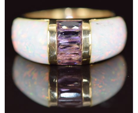 A 14k gold ring set with two synthetic opals and amethysts, 6.2g, size O