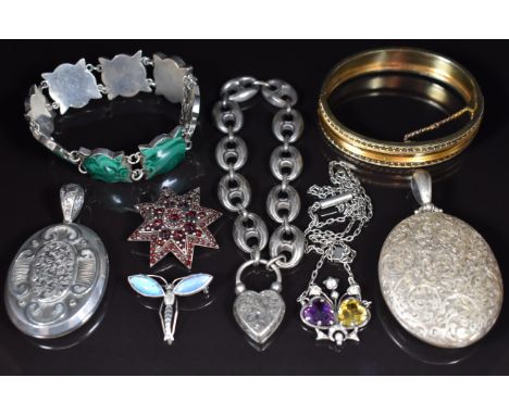 A collection of silver jewellery including two Victorian lockets with engraved scrolling decoration, Victorian silver gilt ba