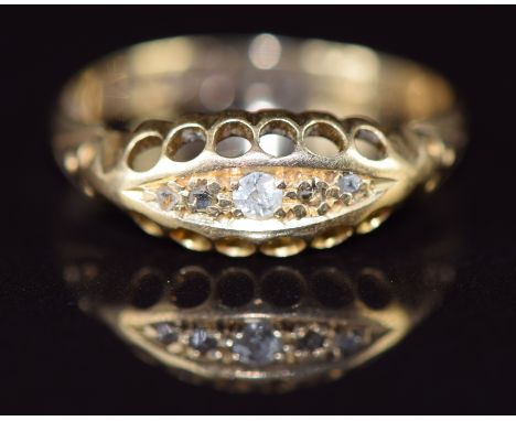 An 18ct gold ring set with five diamonds, Chester 1911, 1.7g, size K