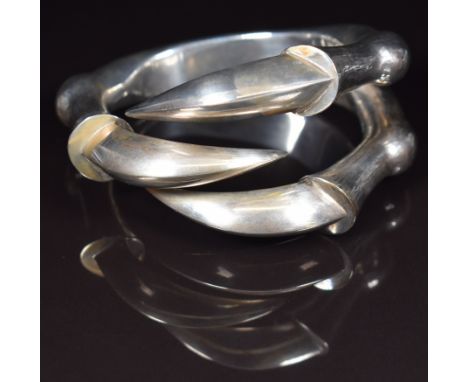 A silver bangle in the form of three claws, stamped with maker K and 925, 95.4g&nbsp;