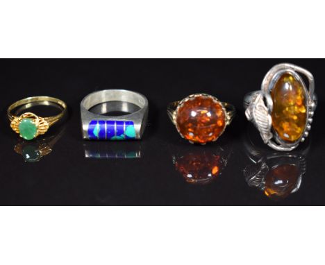 An 18ct gold ring set with a jadeite cabochon (1.6g, size M), two silver rings and another ring