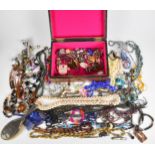 A collection of jewellery including beaded necklaces, filigree brooch, silver backed brush, Siam
