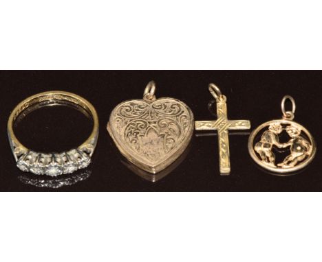 An 18ct gold ring set with five diamonds in a platinum setting (2.9g, size O),&nbsp;9ct gold heart locket with scrolling deco