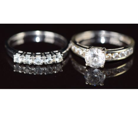 A 9k white gold ring set with five round cut aquamarines and a 9ct white gold ring set with paste, 3.8g, sizes L &amp; N