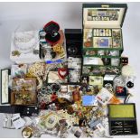 A large collection of costume jewellery including silver pendants, Swarovski bells, vintage