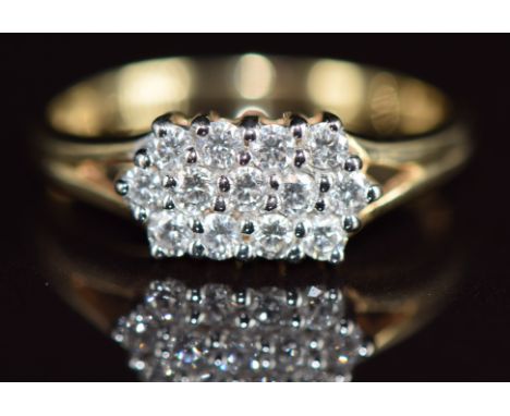 A 9k gold ring set with three rows of internally flawless diamonds, colour D, total diamond weight approximately 0.33ct, 1.9g