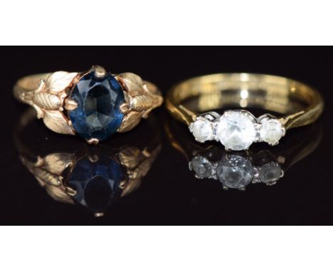 An 18ct gold ring set with three white sapphires and a 14k gold ring set with paste , 5.3g, sizes Q &amp; P