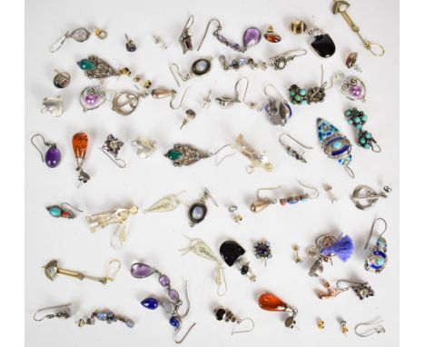 A collection of silver/ white metal earrings including amethyst, garnet, enamel, amber, etc, 130g&nbsp;