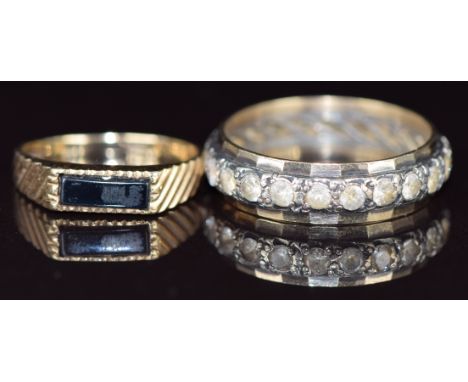 A 9ct gold eternity ring set with spinel and a 9ct gold ring set with onyx, 5.6g, sizes Q &amp; J