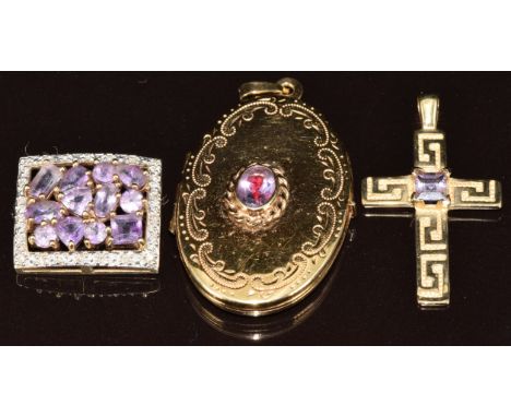 Three 9ct gold pendants set with amethysts, 10.2g