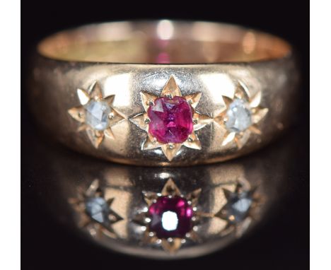 A 15ct gold ring set with a ruby and two rose cut diamonds, Birmingham 1896, 4.5g, size P