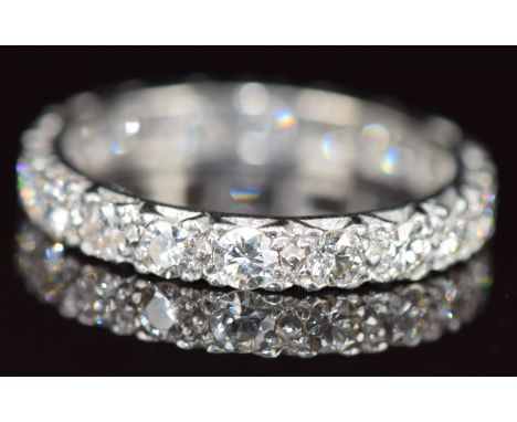 A platinum eternity ring set with diamonds, each approximately 0.08ct, 4.1g, size N