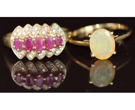 Two 9ct gold rings, one set with an opal the other rubies and diamonds, 5.4g, sizes S &amp; T