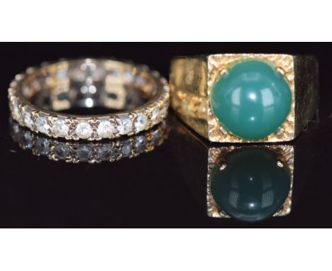 A 9ct gold ring set with a green agate cabochon and a 9ct gold eternity ring, 7g, sizes M &amp; N