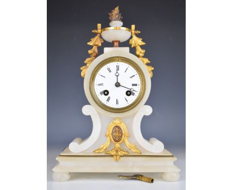 Samuel Marti 19thC French alabaster and gilt metal mantel clock, the two train movement striking on a bell, with white enamel